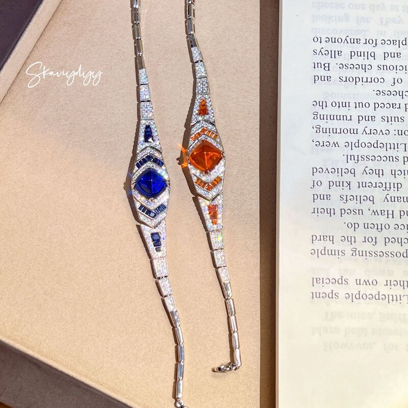 Luxurious and Elegant Bracelet with Heavy Craftsmanship, Featuring Fanta Sugar Tower Cut Design, Fully Adorned with Diamonds and Royal Blue Sapphires Luxurious and Elegant Bracelet with Heavy Craftsmanship, Featuring Fanta Sugar Tower Cut Design, Fully Adorned with Diamonds and Royal Blue Sapphires