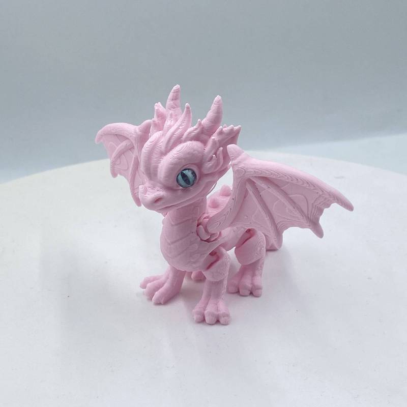 3Dプリントされたかわいい西洋のドラゴンの羽と尾は縮めたり動かしたりできる関節が付いており、子供向けのギフト、おもちゃ、モデルの装飾品です。|undefined