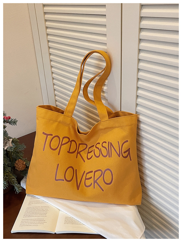Bolsas coreanas de gran capacidad para mujeres 2026 nuevas letras de impresión de moda bolsas axilales de hombro para viajar bolsas de ocio