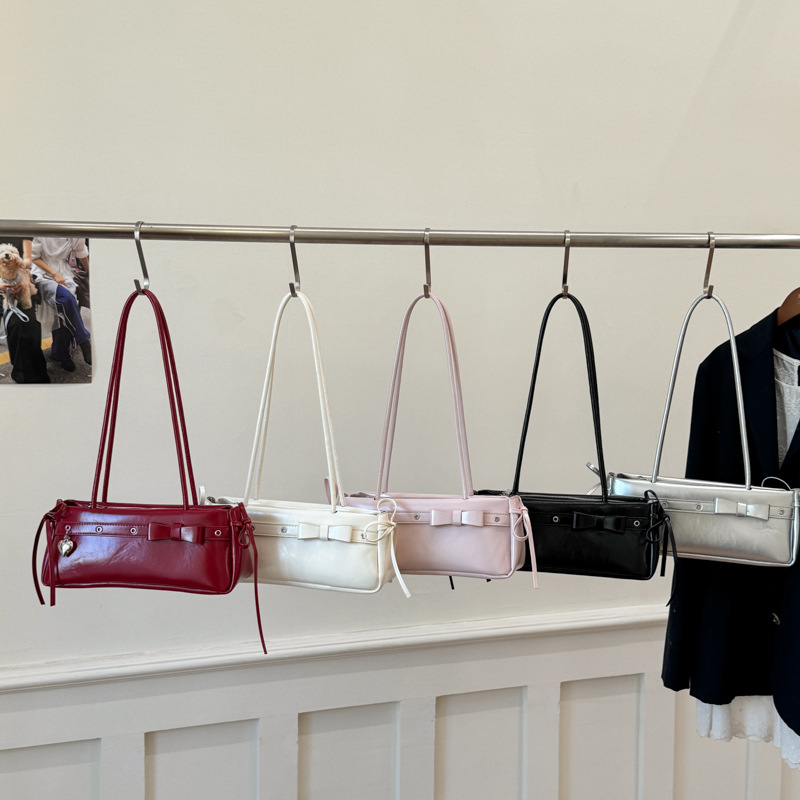 Texturas transfronterizas lujosas pequeñas bolsas de mano para mujeres verano 2026 nueva moda de moda de brazalete de hombro de moda