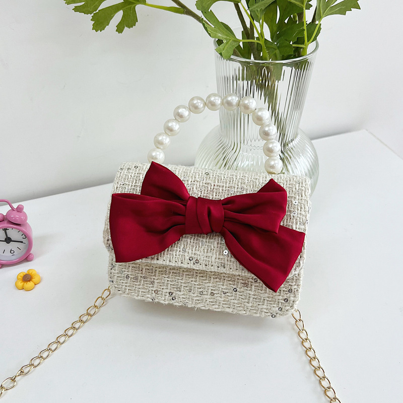 Bolsos infantiles, bolsos de arco, bolsos de moda, bolsos de princesa, bolsos de hombro para niñas, bolsos de cambio para reducir la carga