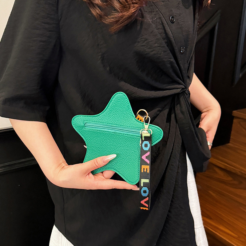 Tendencia de moda transfronteriza nueva forma de estrella de color sólido estilo occidental sentido de diseño de nicho casual bolso de mano para mujer