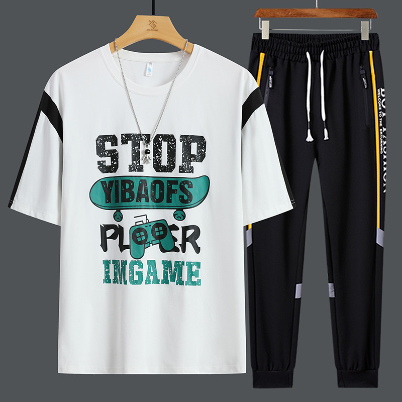 Conjunto de dos piezas de camiseta de cuello redondo holgada y deportiva informal juvenil de moda para el verano 2025 con pantalones y traje de manga corta para hombre