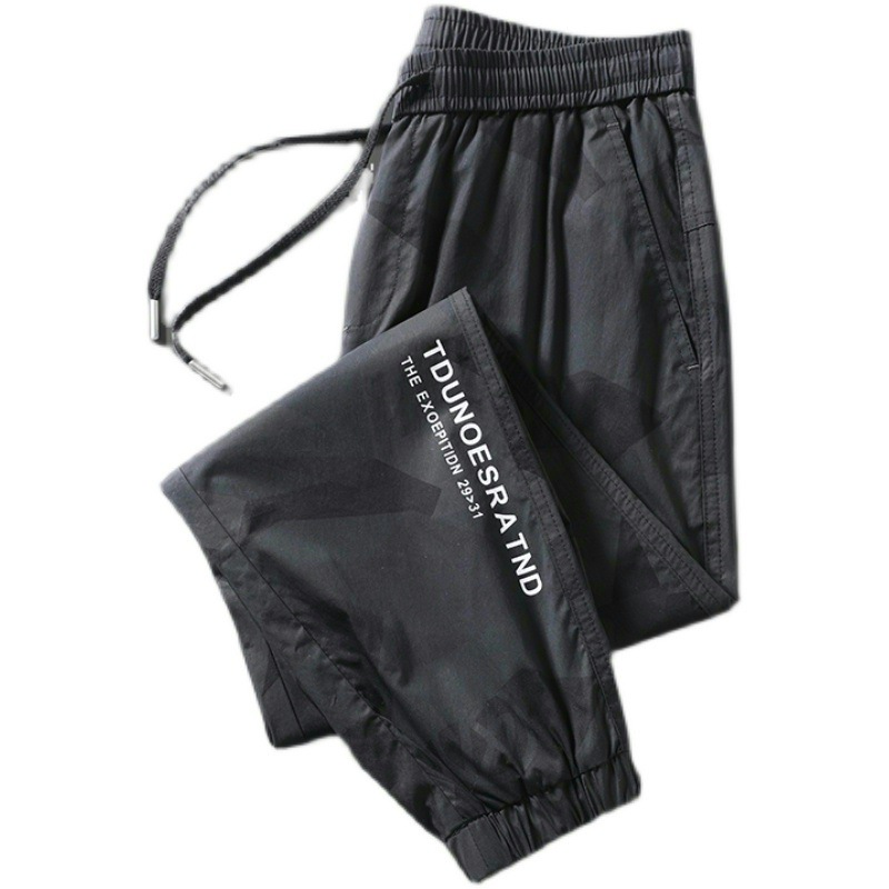 Pantalones de los hombres de verano delgado estilo coreano de moda hasta el tobillo pantalones deportivos casuales pantalones sueltos de camuflaje de los hombres