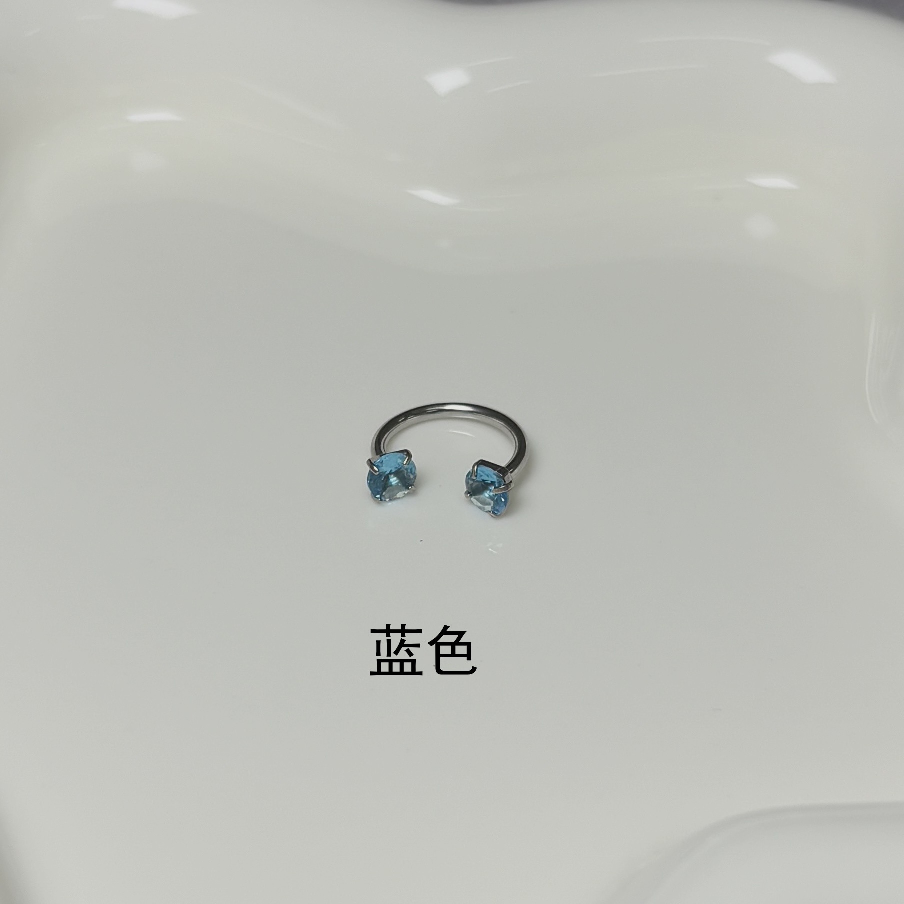 Silver pointed spike labret stud material detail