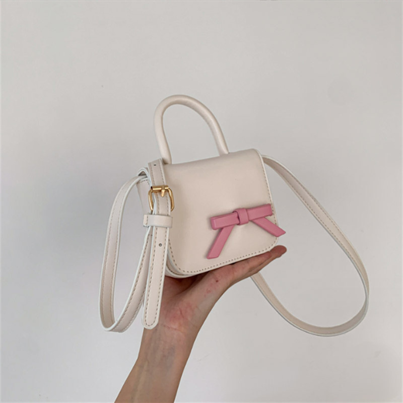 2025 primavera y verano estilo caliente moda casual niños dulces bolsa de gelatina mini bolso de mensajero de un solo hombro variedad al por mayor