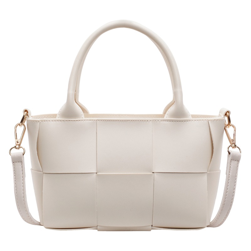 Diseño coreano de nicho de alta sensación portátil bolso de cubo de moda para mujeres 2024 nuevo tejido retro hombro mochila