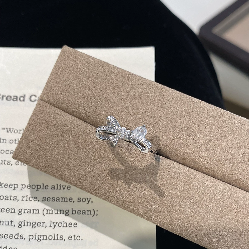 Fashionable sophisticated ring with bow, silver 925 sample, light luxury style, high-quality style, on index finger