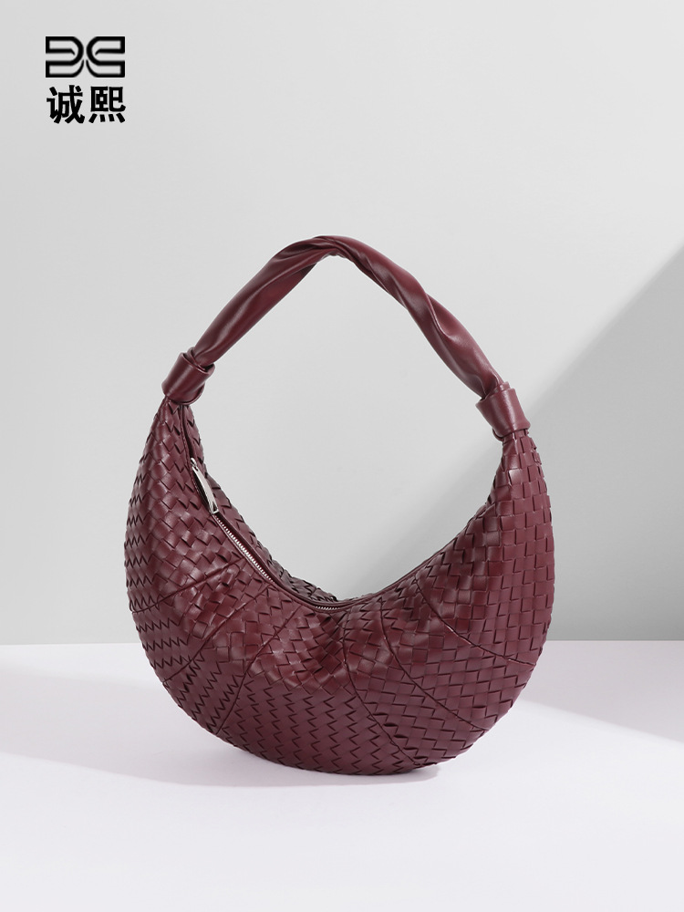 アマゾンの人気牛の角編みの三日月の包みのファッション的な手は復古のギョーザの包みを持ちます。