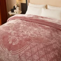 Wedding flowers, winter warm coral duvet