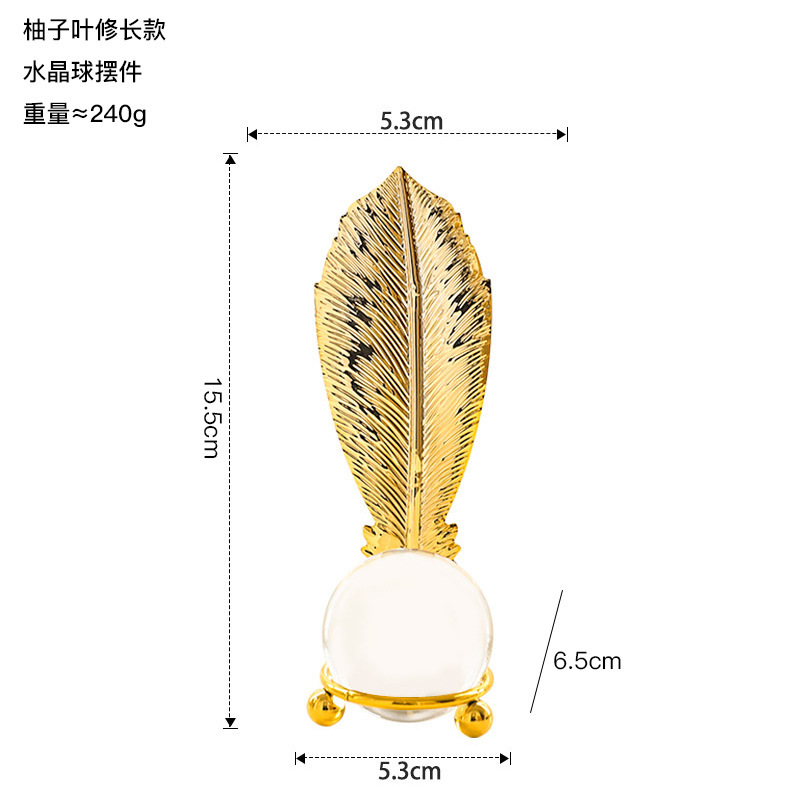 北欧の軽い豪華な金属の木の葉の水晶の玉は書斎の本棚の酒の枠のモデルハウスの玄関の装飾の置物を置きます。|undefined