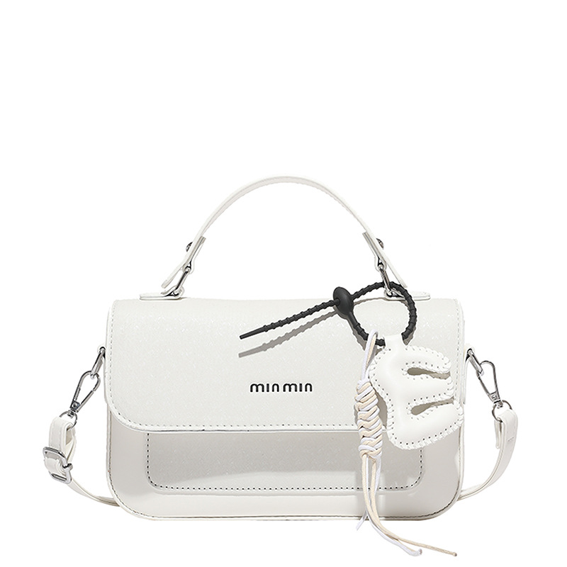 Textura al por mayor de lujo ligero bolso de mano bolso de mujer otoño 2025 nuevo estilo extranjero empalme bolso de hombro bolso de viaje