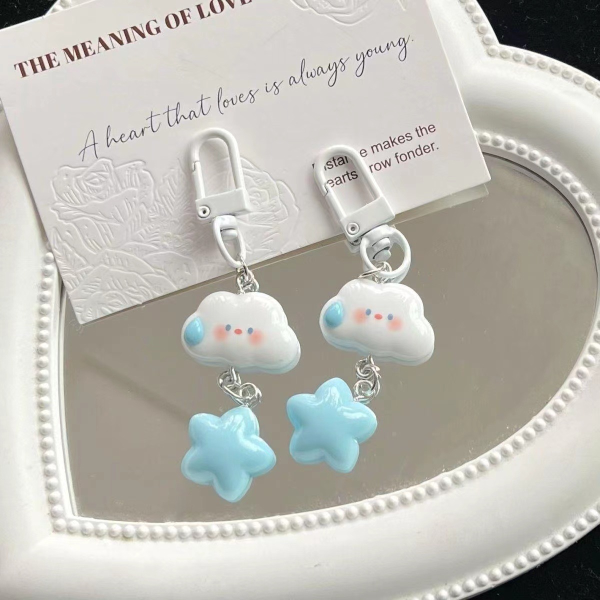 Expresión silenciosa de dibujos animados estrella serie llavero nube DIY creativo pequeña joyería estudiante novias regalo colgante