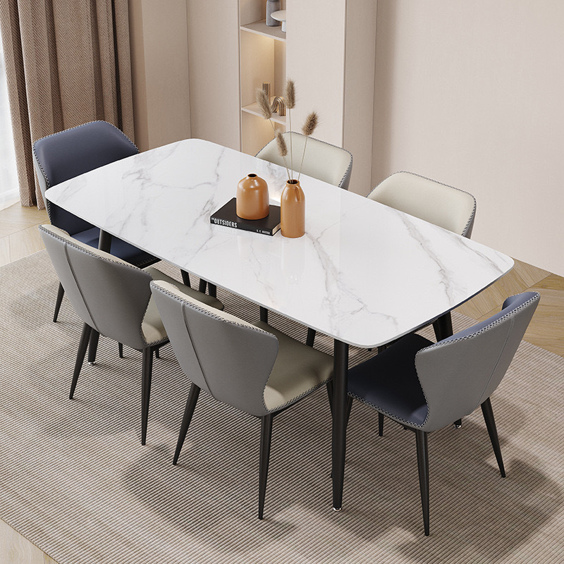 Mesa y silla de comedor de tabla de roca ligera de estilo italiano de lujo, combinación de mesa y silla de comedor de apartamento rectangular moderno y simple.