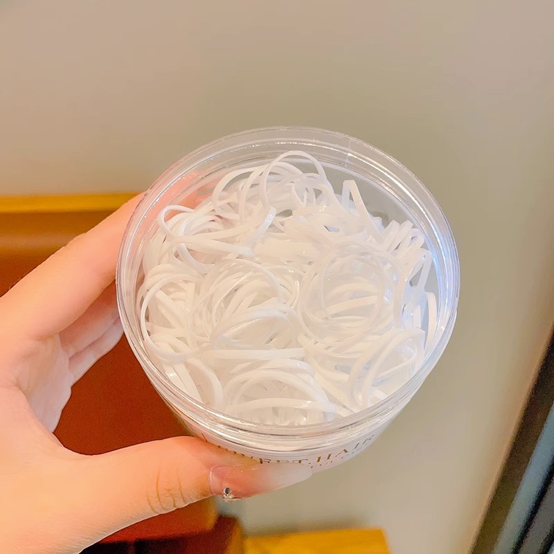 El cabello del bebé está atado, la banda elástica alta, la banda elástica desechable, la trompeta de color para niños no daña el cabello, la banda elástica pequeña