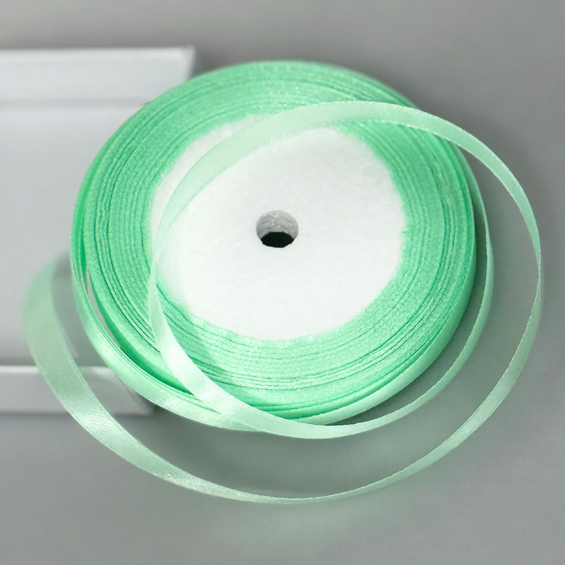 Venta directa de fábrica 1cm cinta de satén cinta de satén caja de regalo cinta decorativa lazo cinta de satén de seda suministro especial transfronterizo al por mayor