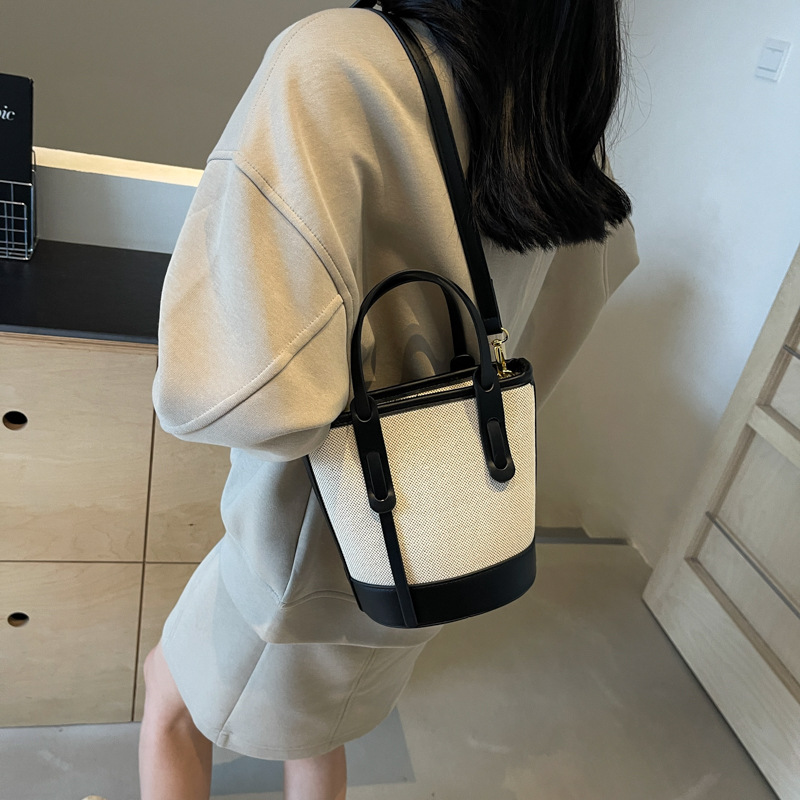 Bolsa de balde de color de contraste popular de este año 2026 nuevo bolso de hombro universal bolso de viaje simple de alta calidad