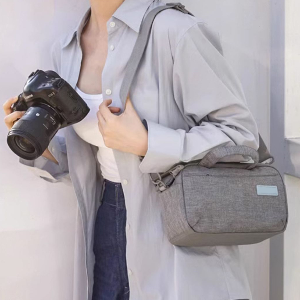 국경 2023 새로운 경량 어깨 핸드백 사진 가방 SLR 배낭 마이크로 단일 카메라 가방 캐논 가방
