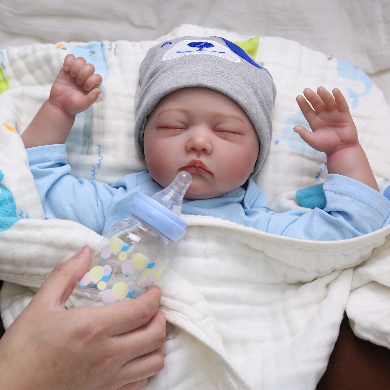 Cambiar juguetes de goma blanda una muñeca transfronteriza de 55cm puede simular muñecas bebés pesados muñecas de cabello Henghua