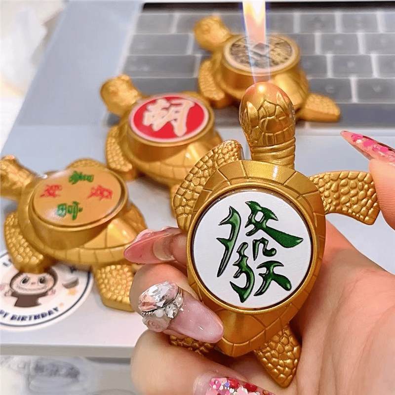 Zhao Caijin Bao tortuga de oro infláble llama abierta encendedor creativo tortuga de oro pequeña tortuga de metal para enviar novio encendedor image 1