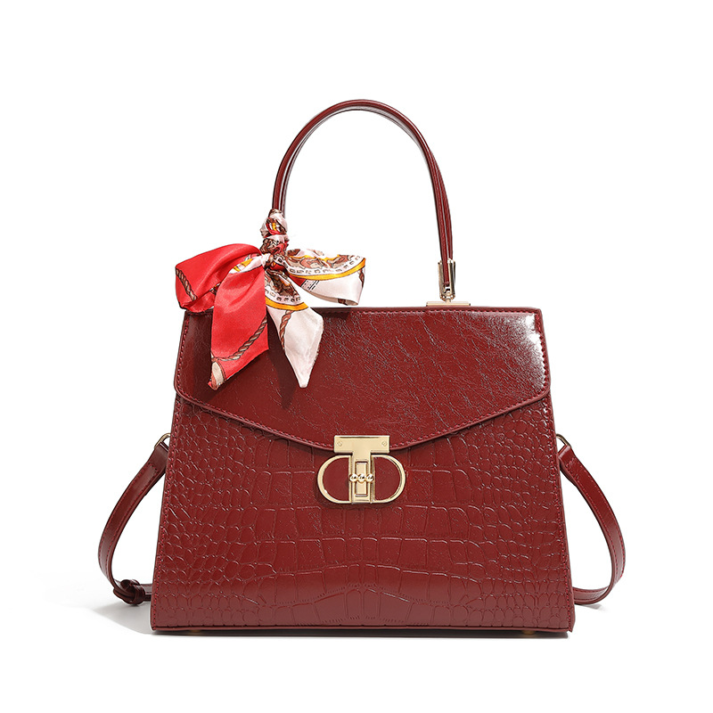 Bolso de mano con patrón de cocodrilo para mujeres 2025, nueva moda, lujo ligero, bolso de hombro universal, alta sensación de gran capacidad, mochila.