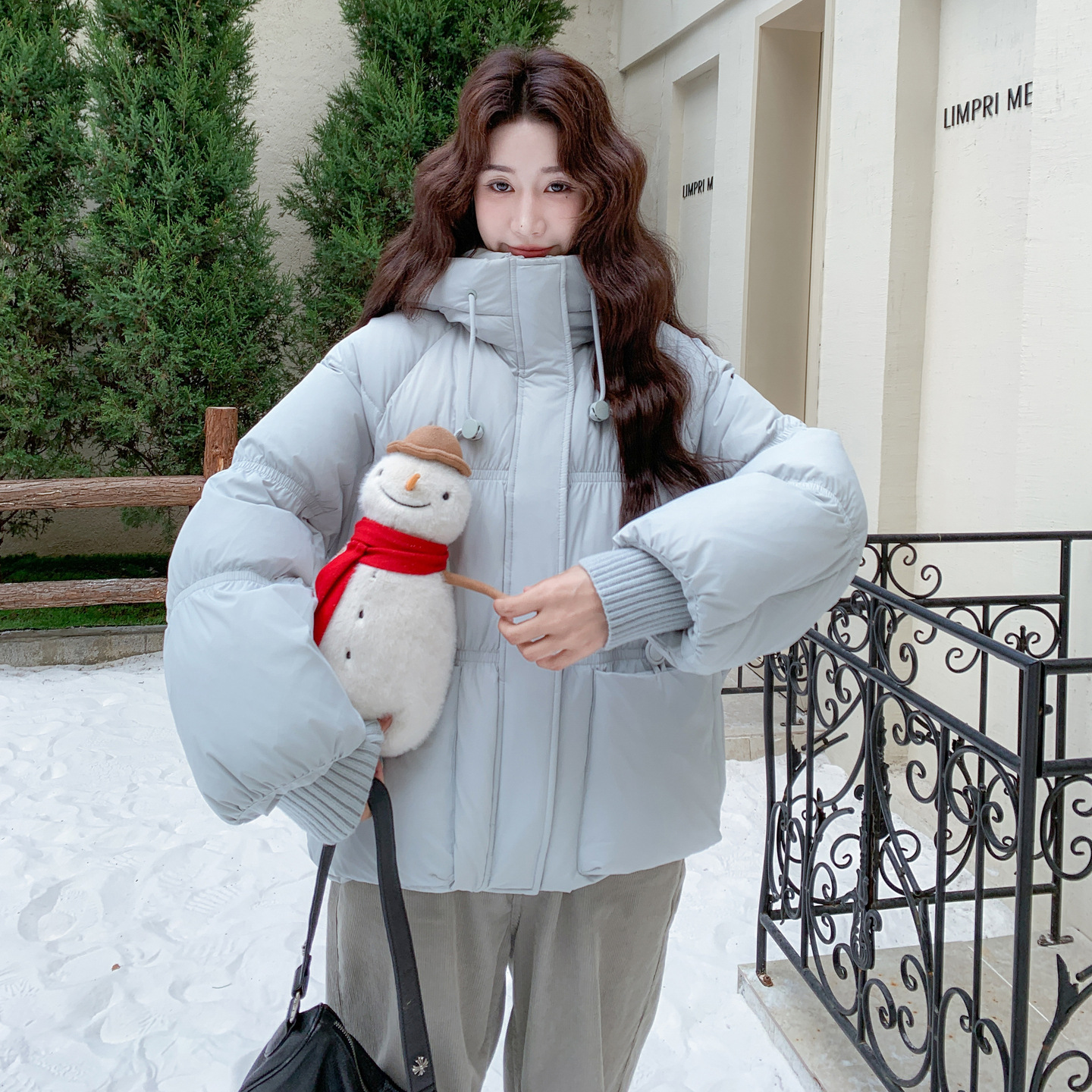 蓝色羽绒服女款2025冬季新款超好看韩版宽松连帽慵懒风加厚面包服