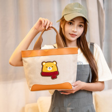 新款帆布女包广州工厂批发手提刺绣熊布包便当午餐收纳袋化妆包