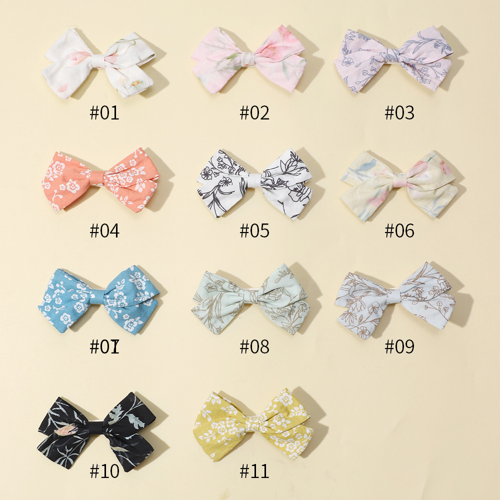 Fermagli per capelli con fiocco per bambine clip stampate_voghion.com