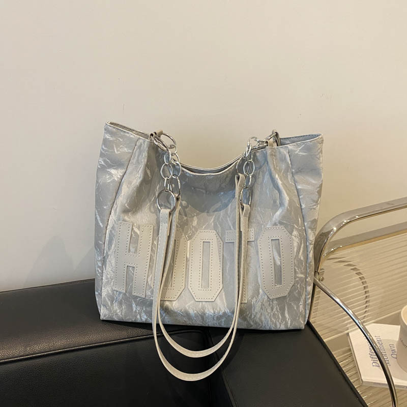 Bolsos casuales de gran capacidad para viajeros para damas 2024 nuevo estilo estilo occidental bolso de hombro todo fósforo bolso portátil de alta gama