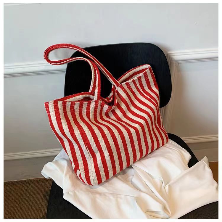 Pequeña bolsa de lona a rayas frescas de hombro para mujeres, bolsas escolares de clase de gran capacidad, bolsas de compras japonesas y coreanas, bolsas especiales.