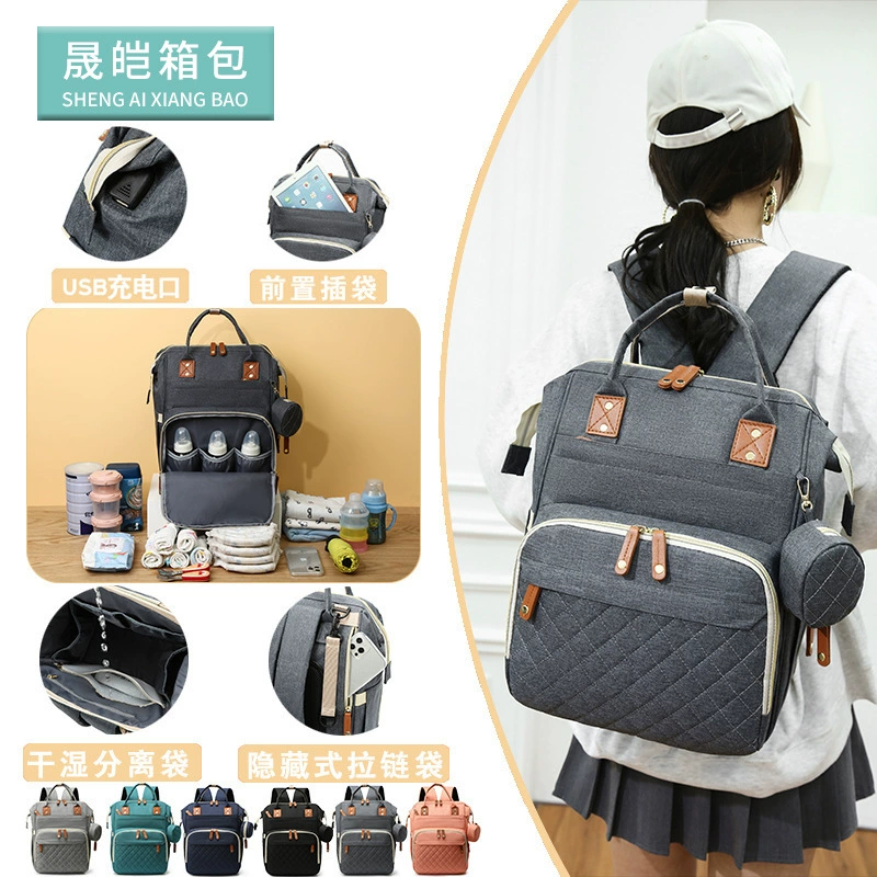 Capacious handheld bag for mother and baby, backpack