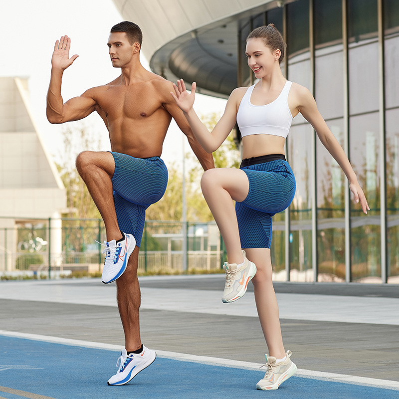 Pantalones de yoga para correr y hacer ejercicio en atletismo en verano con pantalones cortos ajustados y pantalones de cinco puntos con alta elasticidad y compresión para levantar las caderas.