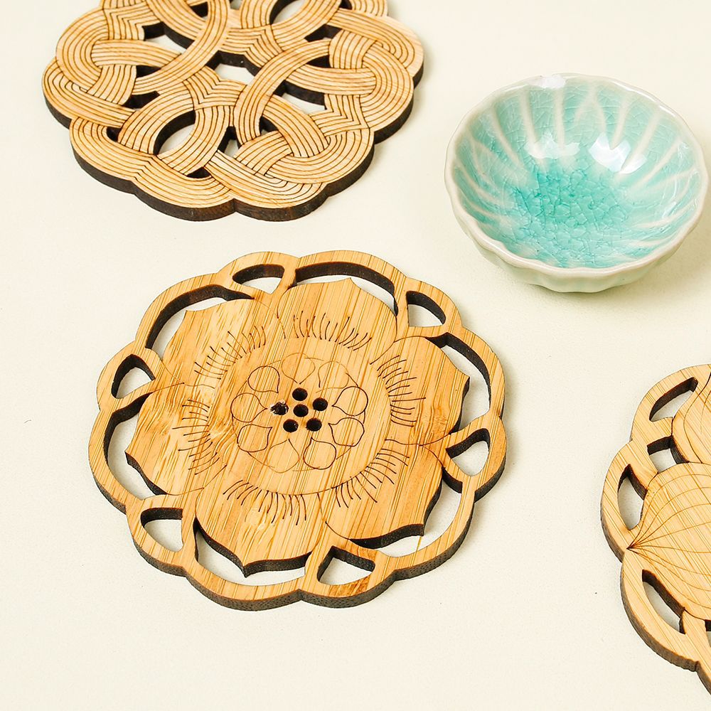 Posavasos de bambú Almohadilla de aislamiento térmico antiescaldado Asiento de té zen hueco creativo Almohadilla de portavasos Almohadilla de olla Varias almohadillas de té talladas