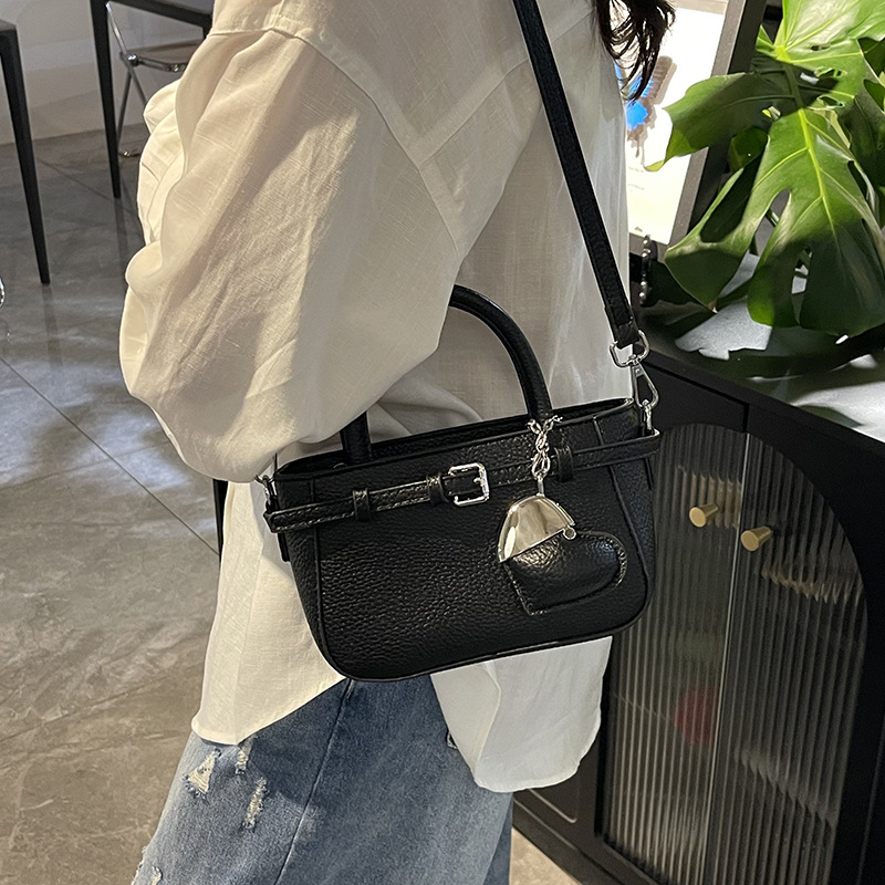 Bolso Tote de diseño de nicho 2025 verano nuevo estilo bolso de hombro con patrón de lichi bolso de mensajero de amor de moda mujer