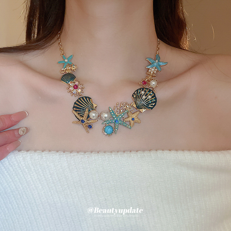 Collar de pendientes de coral de concha de estrella de mar goteando aceite, cadena de clavícula de todo fósforo de moda europea y americana, traje de nicho, lujo ligero, sentido de alta gama