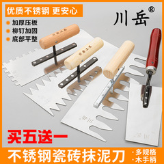 Complete collection of masonry tools, toothed plastering knife, serrated trowel, tile laying trowel, scraper, trowel, masonry batch