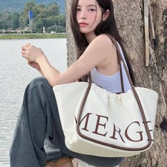 タイのまなざしの特包の大容量のカジュアルな女性カバンの怠惰な風の片肩の布の包みの通勤の百合の手提げの大きい包み