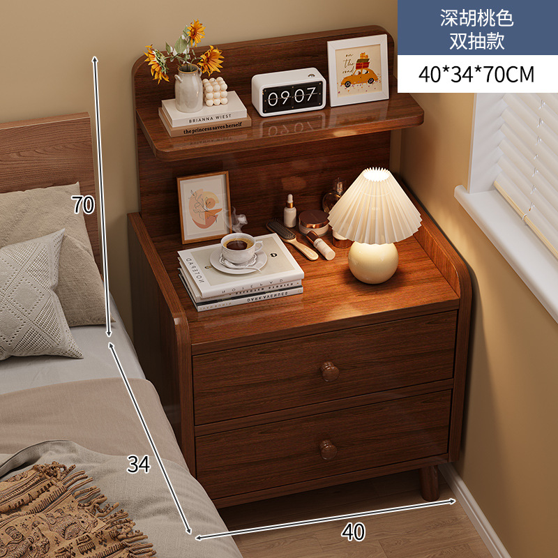 Mesilla de noche simple y moderno armario de almacenamiento de pierna de madera maciza pequeño dormitorio simple hogar 2025 nuevo estante de cabecera