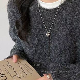 Minimalist silver love pendant necklace for women in autumn and winter light luxury high-end titanium steel pull-out long sweater chain accessories