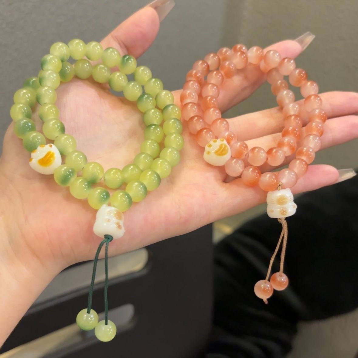 Cute garra de gato Bodhi doble anillo pulsera estudiantes alrededor de los dedos suave para jugar pulsera dulce de alto valor facial pareja regalo de amiga