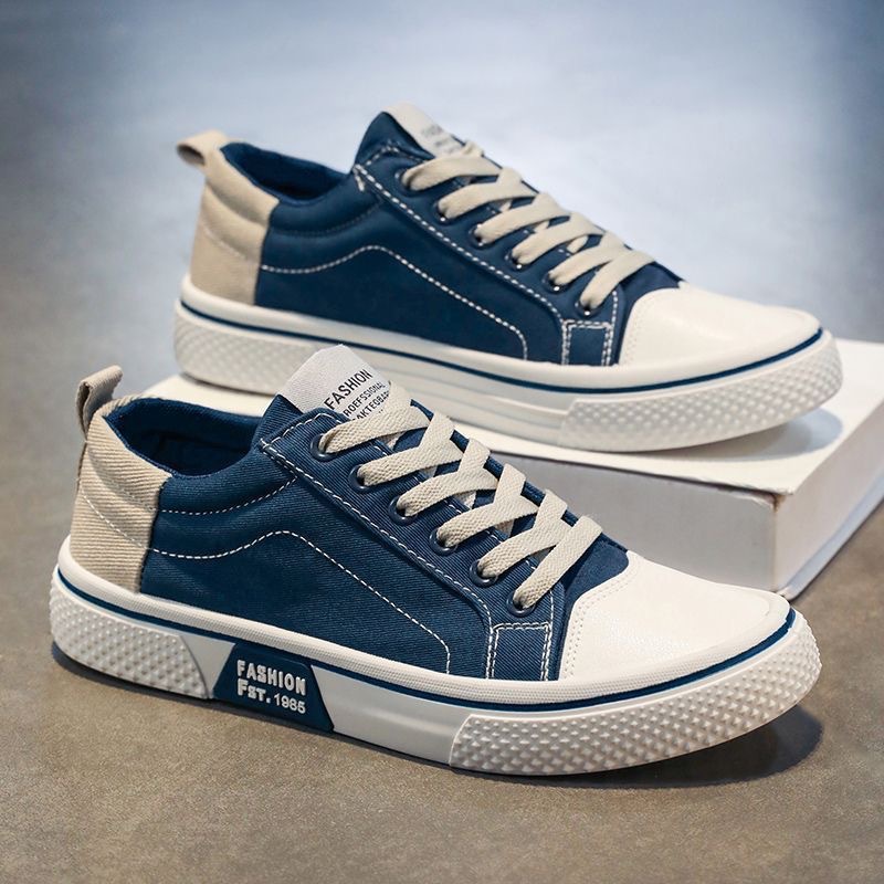 Primavera y verano zapatos de hombre nuevos zapatos de skate deportivos transpirables para hombres, zapatos de lona de moda casuales suaves para hombres