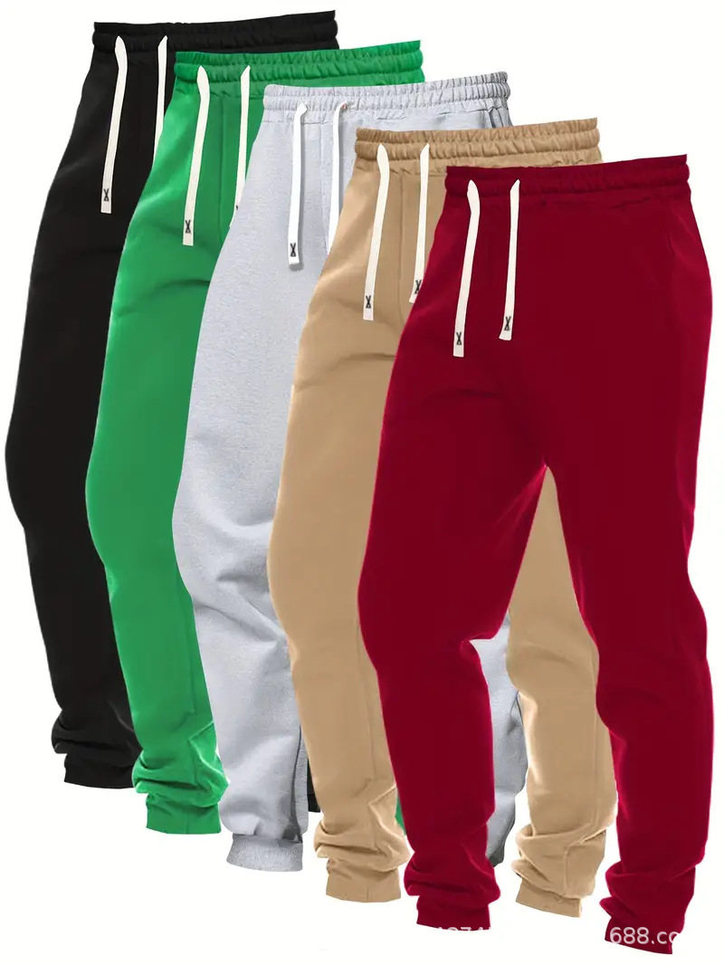 2026 explosión transfronteriza pantalones deportivos de moda masculinos de cinco piezas de color sólido cómodos ociosos pantalones de alimentación directa plataforma