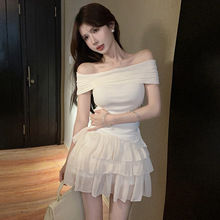 F01欧美东南亚外贸批发2024女装纯欲风不规则上衣+蓬蓬半身裙套装