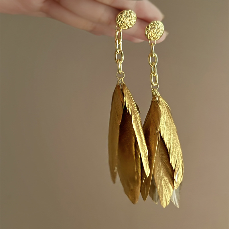 Boucles d'oreilles à pompon en plumes dorées et argentées, boucles d'oreilles rétro de niche française, boucles d'oreilles de style ethnique exotique, nouvelles boucles d'oreilles de style chinois_voghion.com