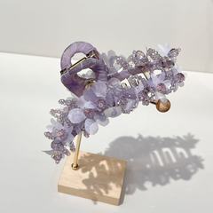 清新なオリジナルの花の水晶は女性の超仙の高級感を挟んでサメを刺してサイズの後頭部を挟んで髪を伸ばします。