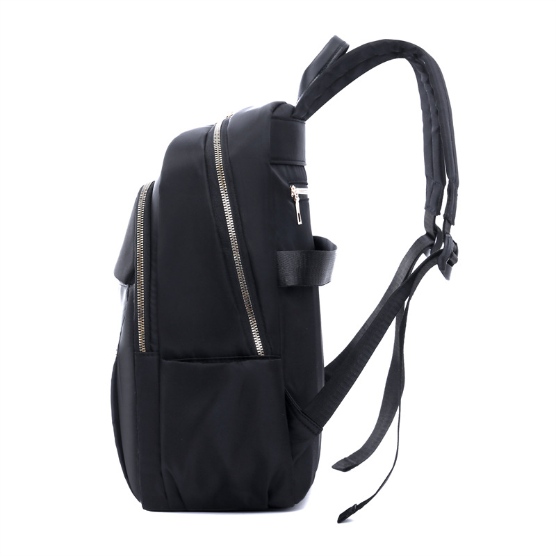 Comercio exterior al por mayor 2024 nuevas señoras de gran capacidad mochila para computadora de 15 pulgadas moda simple mochila de viaje ligera