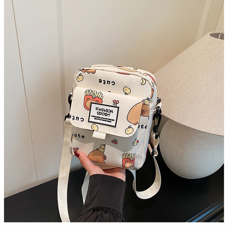 Cartoon animal print, many pockets, few bags, single-shoulder bag for girls, large capacity, cute graffiti, lightweight schoolbag for primary and middle school students undefined