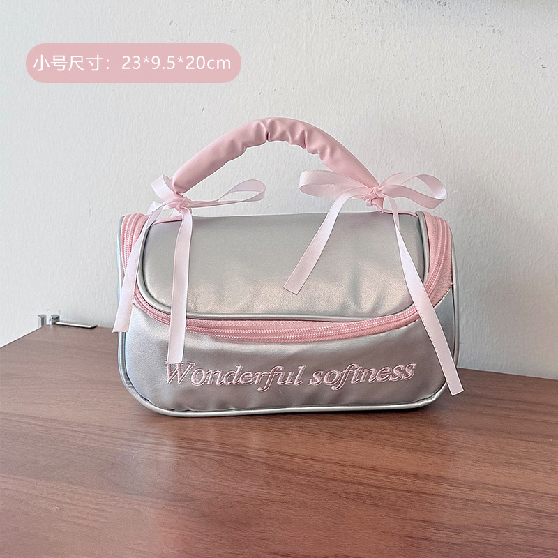 Bolsa de maquillaje de arco de corazón de niña portátil, bolsa de almacenamiento portátil, bolsa de lavado impermeable de gran capacidad