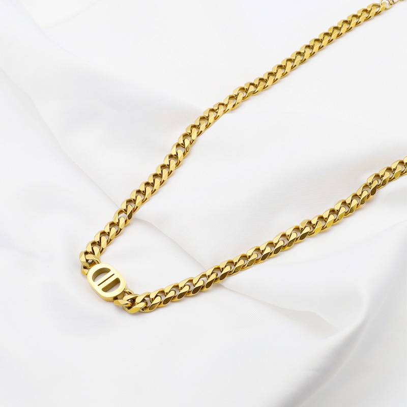 Ins estilo europeo y americano hip hop hipster titanio acero cubano cadena personalidad 18K oro doble D titanio collar de acero al por mayor no se desvanece