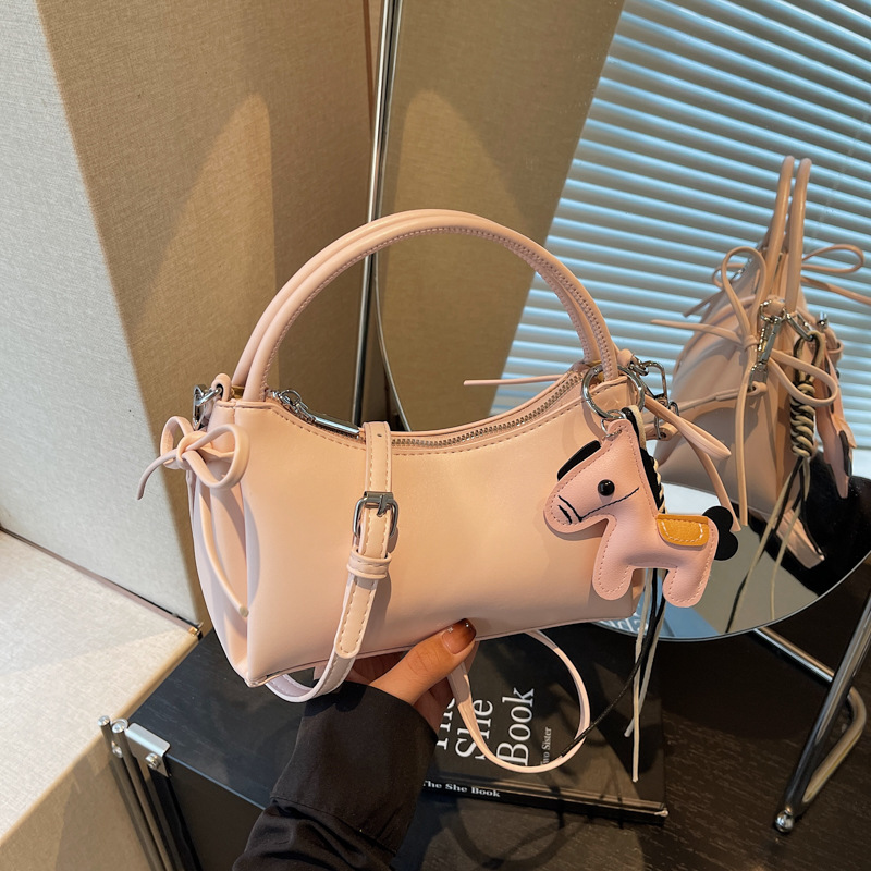 Meilade viento suave cuero brazo bolso para mujeres 2026 nuevo estilo de moda de viaje bolso de hombro sensación diaria simple mochila